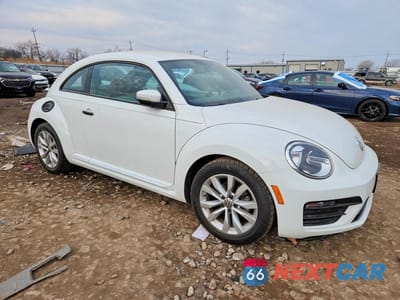 Czwarte zdjęcie samochodu z boku: 2017 VOLKSWAGEN BEETLE 1.8T VIN:3VWF17AT7HM623114 - miniatura