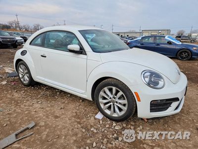 Czwarte zdjęcie samochodu z boku: 2017 VOLKSWAGEN BEETLE 1.8T VIN:3VWF17AT7HM623114 - miniatura