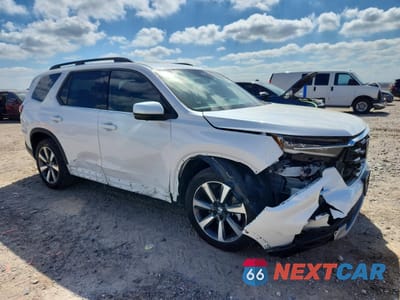 Czwarte zdjęcie samochodu z boku: 2024 HONDA PILOT ELITE VIN:5FNYG1H80RB009634 - miniatura