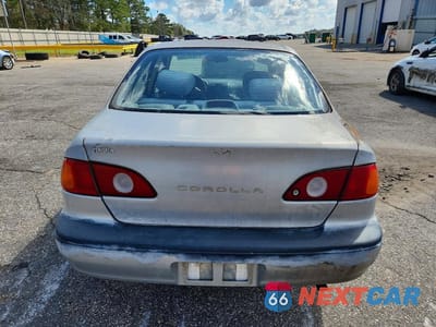 Zdjęcie 6 z 11 samochodu: 2001 TOYOTA COROLLA LE VIN:1NXBR12E71Z517606 - miniatura