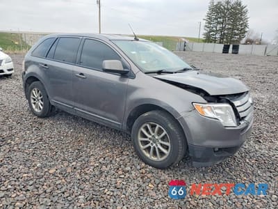 Czwarte zdjęcie samochodu z boku: 2010 FORD EDGE SEL VIN:2FMDK4JC0ABB34837 - miniatura