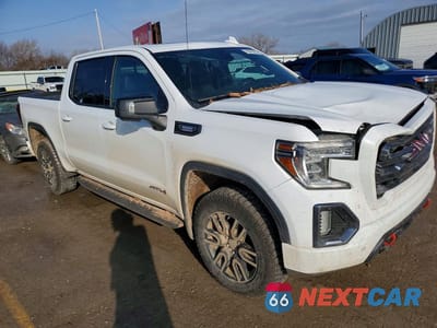 Czwarte zdjęcie samochodu z boku: 2021 GMC SIERRA K1500 AT4 VIN:3GTU9EET6MG203824 - miniatura