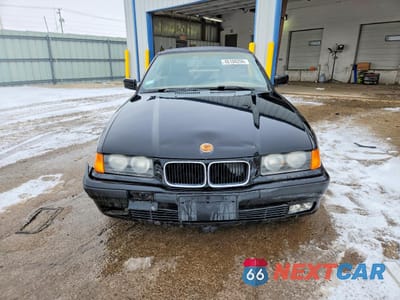 Piąte zdjęcie samochodu w środku: 1994 BMW 325 IC AUTOMATIC VIN:WBABJ6329RJD36484 - miniatura