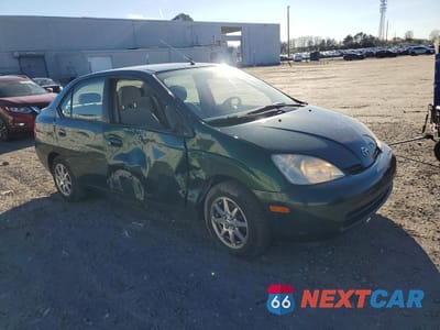 Czwarte zdjęcie samochodu z boku: 2003 TOYOTA PRIUS BASE VIN:JT2BK18UX30075236 - miniatura