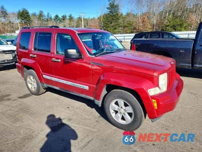 Czwarte zdjęcie samochodu z boku: 2010 JEEP LIBERTY SPORT VIN:1J4PN2GK6AW118498 - miniatura