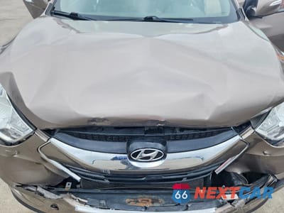 Zdjęcie 12 z 13 samochodu: 2013 HYUNDAI TUCSON LIMITED VIN:KM8JU3AC9DU604787 - miniatura