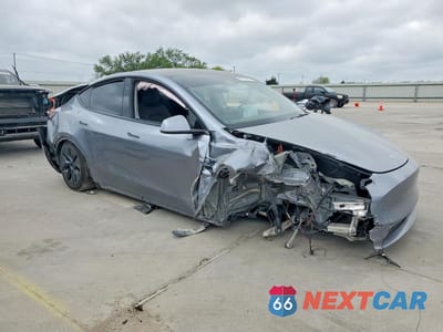 Czwarte zdjęcie samochodu z boku: 2024 TESLA MODEL Y VIN:7SAYGDEEXRA320533 - miniatura
