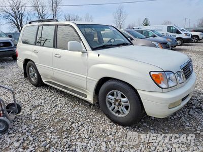 Czwarte zdjęcie samochodu z boku: 1999 LEXUS LX 470 BASE VIN:JT6HT00W7X0068988 - miniatura