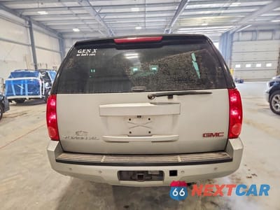 Zdjęcie 6 z 12 samochodu: 2010 GMC YUKON XL K1500 SLT VIN:1GKUKKE39AR124862 - miniatura
