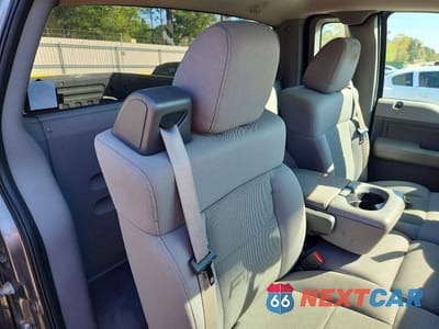 Zdjęcie 10 z 12 samochodu: 2006 FORD F150 VIN:1FTRF12206KB41996 - miniatura