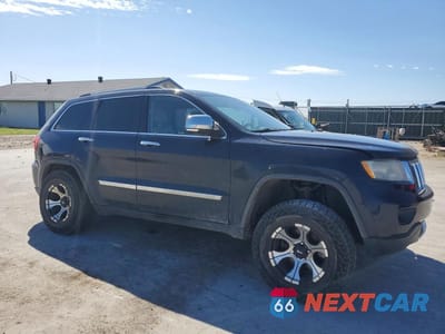 Czwarte zdjęcie samochodu z boku: 2011 JEEP GRAND CHEROKEE LIMIT VIN:1J4RR5GT2BC500912 - miniatura