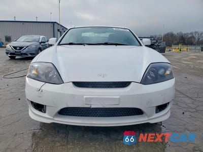 Piąte zdjęcie samochodu w środku: 2005 HYUNDAI TIBURON GS VIN:KMHHM65DX5U174840 - miniatura