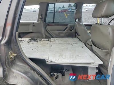 Zdjęcie 10 z 13 samochodu: 2000 JEEP GRAND CHEROKEE LIMITED VIN:1J4GW58N5YC397476 - miniatura