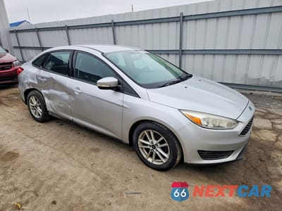 Czwarte zdjęcie samochodu z boku: 2016 FORD FOCUS SE VIN:1FADP3F21GL215621 - miniatura