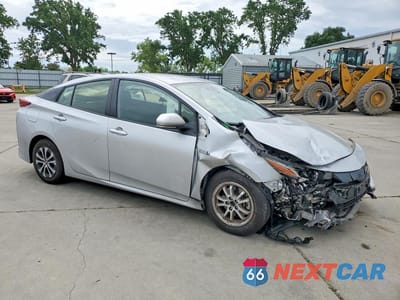Czwarte zdjęcie samochodu z boku: 2021 TOYOTA PRIUS PRIME XLE VIN:JTDKAMFP6M3170305 - miniatura