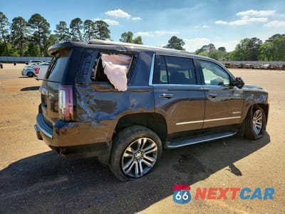 Trzecie zdjęcie samochodu z tyłu: 2017 GMC YUKON DENALI VIN:1GKS1CKJ7HR292934 - miniatura