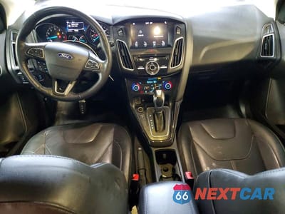 Zdjęcie 8 z 13 samochodu: 2018 FORD FOCUS TITANIUM VIN:1FADP3N27JL232609 - miniatura