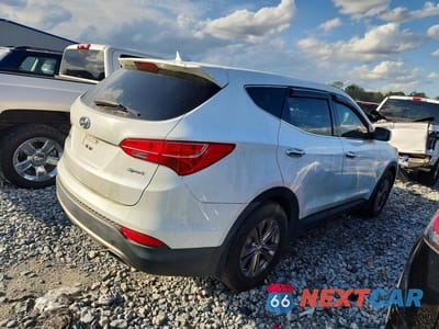 Trzecie zdjęcie samochodu z tyłu: 2013 HYUNDAI SANTA FE SPORT 2.4L VIN:5XYZT3LB5DG045013 - miniatura