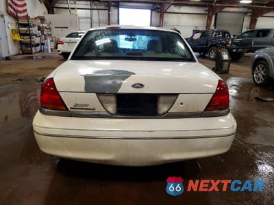 Zdjęcie 6 z 12 samochodu: 2003 FORD CROWN VICTORIA LX VIN:2FAFP74W03X161036 - miniatura