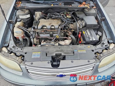 Zdjęcie 11 z 12 samochodu: 2003 CHEVROLET MALIBU VIN:1G1ND52J73M693765 - miniatura