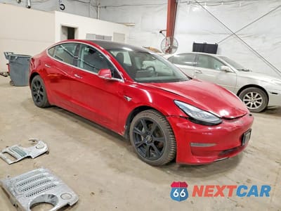 Czwarte zdjęcie samochodu z boku: 2018 TESLA MODEL 3 VIN:5YJ3E1EB9JF054995 - miniatura
