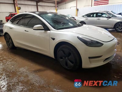 Czwarte zdjęcie samochodu z boku: 2021 TESLA MODEL 3 VIN:5YJ3E1EAXMF982987 - miniatura