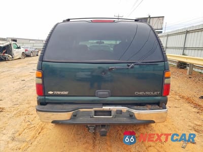 Zdjęcie 6 z 12 samochodu: 2004 CHEVROLET TAHOE K1500 VIN:1GNEK13T84J121068 - miniatura