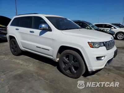 Czwarte zdjęcie samochodu z boku: 2017 JEEP GRAND CHEROKEE OVERLAND VIN:1C4RJFCG1HC913098 - miniatura