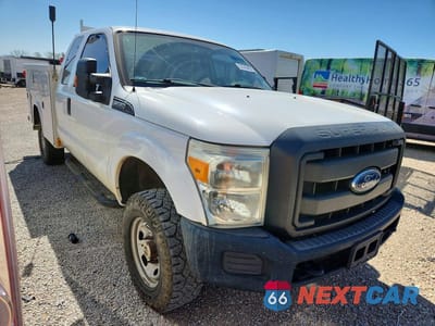 Czwarte zdjęcie samochodu z boku: 2015 FORD F350 SUPER DUTY UTILITY / SERVICE TRUCK VIN:1FD8X3B63FED10779 - miniatura