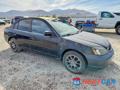 Czwarte zdjęcie samochodu z boku: 2003 HONDA CIVIC LX VIN:2HGES15563H511224 - miniatura