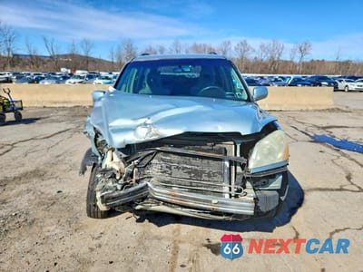 Piąte zdjęcie samochodu w środku: 2003 HONDA PILOT EX VIN:2HKYF184X3H577107 - miniatura