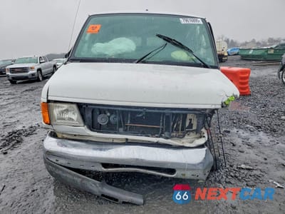 Piąte zdjęcie samochodu w środku: 2004 FORD ECONOLINE E350 SUPER DUTY WAGON VIN:1FBSS31L64HB32916 - miniatura
