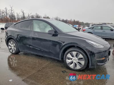 Czwarte zdjęcie samochodu z boku: 2023 TESLA MODEL Y VIN:7SAYGDEE7PF891848 - miniatura