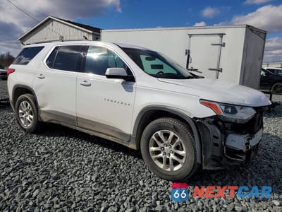 Czwarte zdjęcie samochodu z boku: 2019 CHEVROLET TRAVERSE LT VIN:1GNERGKW7KJ181558 - miniatura