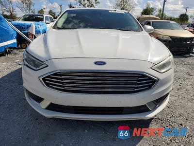 Piąte zdjęcie samochodu w środku: 2018 FORD FUSION SE VIN:3FA6P0HD8JR188674 - miniatura