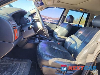 Zdjęcie 7 z 13 samochodu: 2002 JEEP GRAND CHEROKEE SPORT VIN:1J8GW38S42C236293 - miniatura