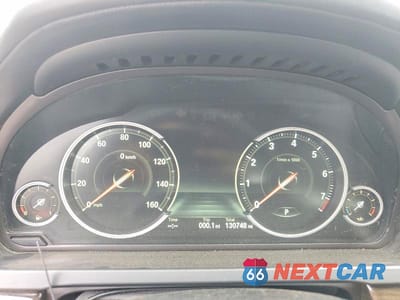 Zdjęcie 9 z 12 samochodu: 2014 BMW 750 LI VIN:WBAYE8C52ED135424 - miniatura