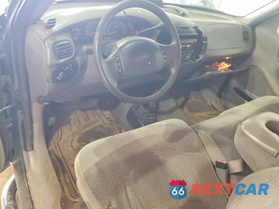 Zdjęcie 8 z 12 samochodu: 1999 FORD F150 VIN:1FTRX18L1XNA06068 - miniatura