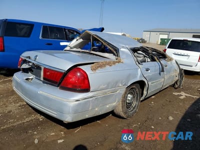 Trzecie zdjęcie samochodu z tyłu: 2002 MERCURY GRAND MARQUIS LS VIN:2MEFM75W22X655557 - miniatura
