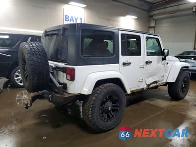 Trzecie zdjęcie samochodu z tyłu: 2013 JEEP WRANGLER UNLIMITED SAHARA VIN:1C4BJWEG3DL539148 - miniatura