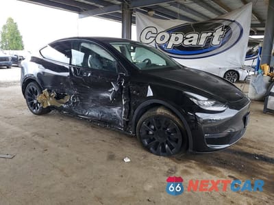Czwarte zdjęcie samochodu z boku: 2022 TESLA MODEL Y VIN:7SAYGDEE7NA017297 - miniatura