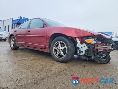 Czwarte zdjęcie samochodu z boku: 2002 PONTIAC GRAND PRIX GT VIN:1G2WP52K42F291348 - miniatura