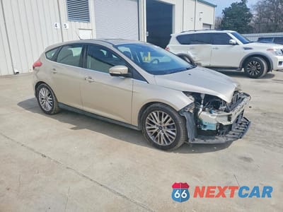 Czwarte zdjęcie samochodu z boku: 2018 FORD FOCUS TITANIUM VIN:1FADP3N27JL237907 - miniatura