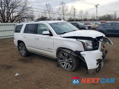 Czwarte zdjęcie samochodu z boku: 2019 GMC YUKON DENALI VIN:1GKS2CKJ9KR328725 - miniatura