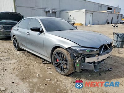 Czwarte zdjęcie samochodu z boku: 2023 BMW M340XI VIN:3MW49FF06P8C99122 - miniatura