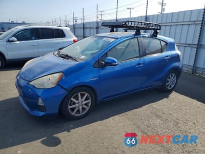 2013 TOYOTA PRIUS C THREE JTDKDTB3XD1034565 - główne zdjęcie licytacji z USA - miniatura