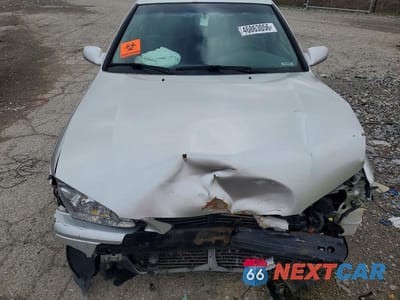 Zdjęcie 11 z 11 samochodu: 2000 TOYOTA CAMRY LE VIN:JT2BG22K8Y0458338 - miniatura