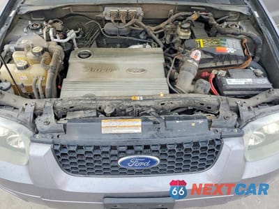 Zdjęcie 11 z 12 samochodu: 2007 FORD ESCAPE HEV VIN:1FMCU49H57KB34479 - miniatura