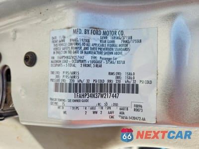 Zdjęcie 13 z 13 samochodu: 2007 FORD FOCUS ZX4 VIN:1FAHP34N37W217447 - miniatura