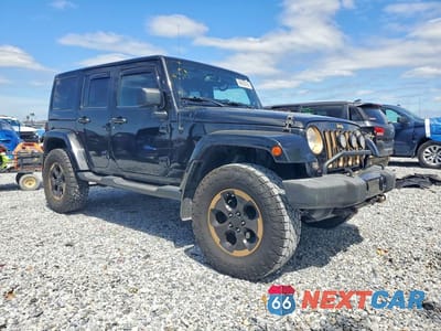 Czwarte zdjęcie samochodu z boku: 2014 JEEP WRANGLER UNLIMITED SAHARA VIN:1C4HJWEG7EL166515 - miniatura
